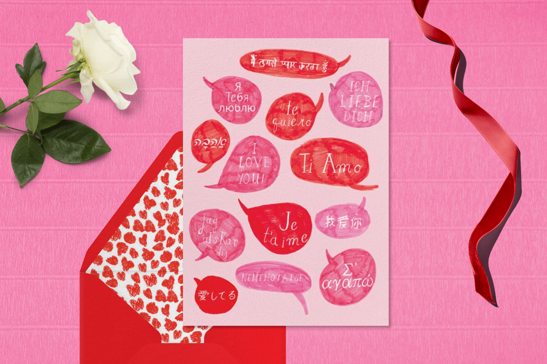 A pink Valentine's Day card with text bubbles filled with the phrase 