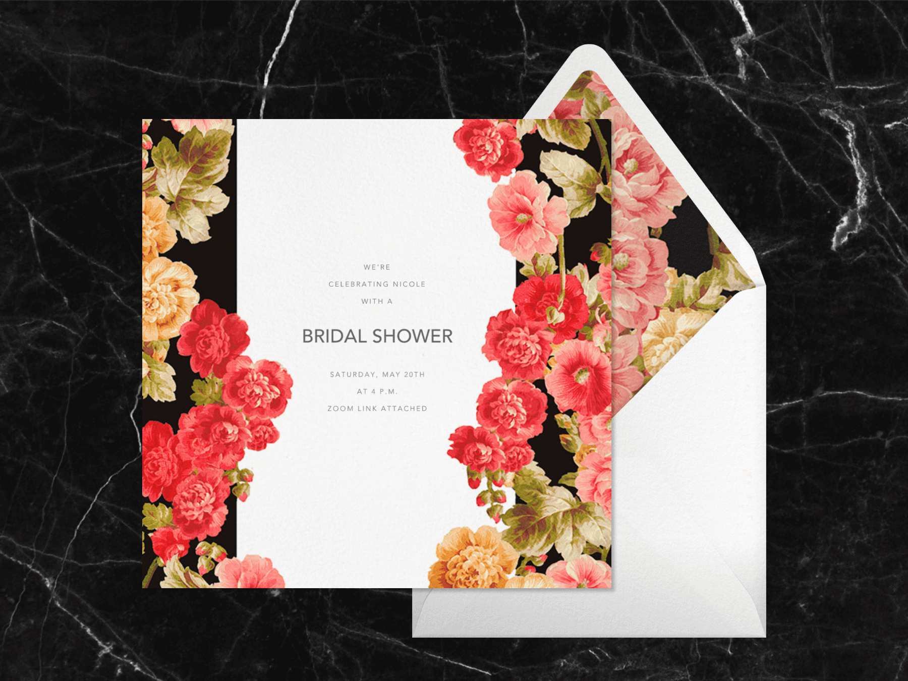 A virtual bridal shower invitation with big graphic garden floral prints on both sides of the text space, paired with a white envelope and matching liner.