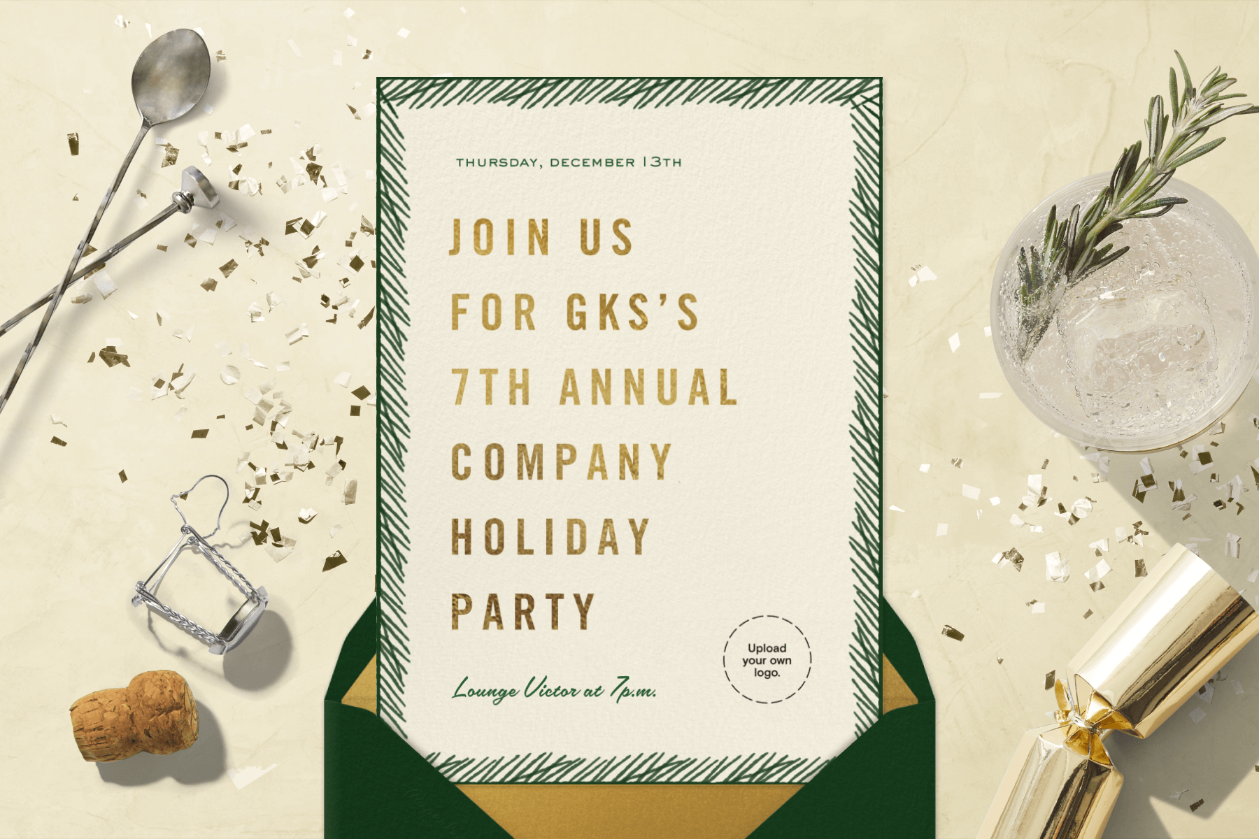 A beige holiday party invitation with a green fringe border, surrounded by holiday themed props like a cocktail and a party cracker.