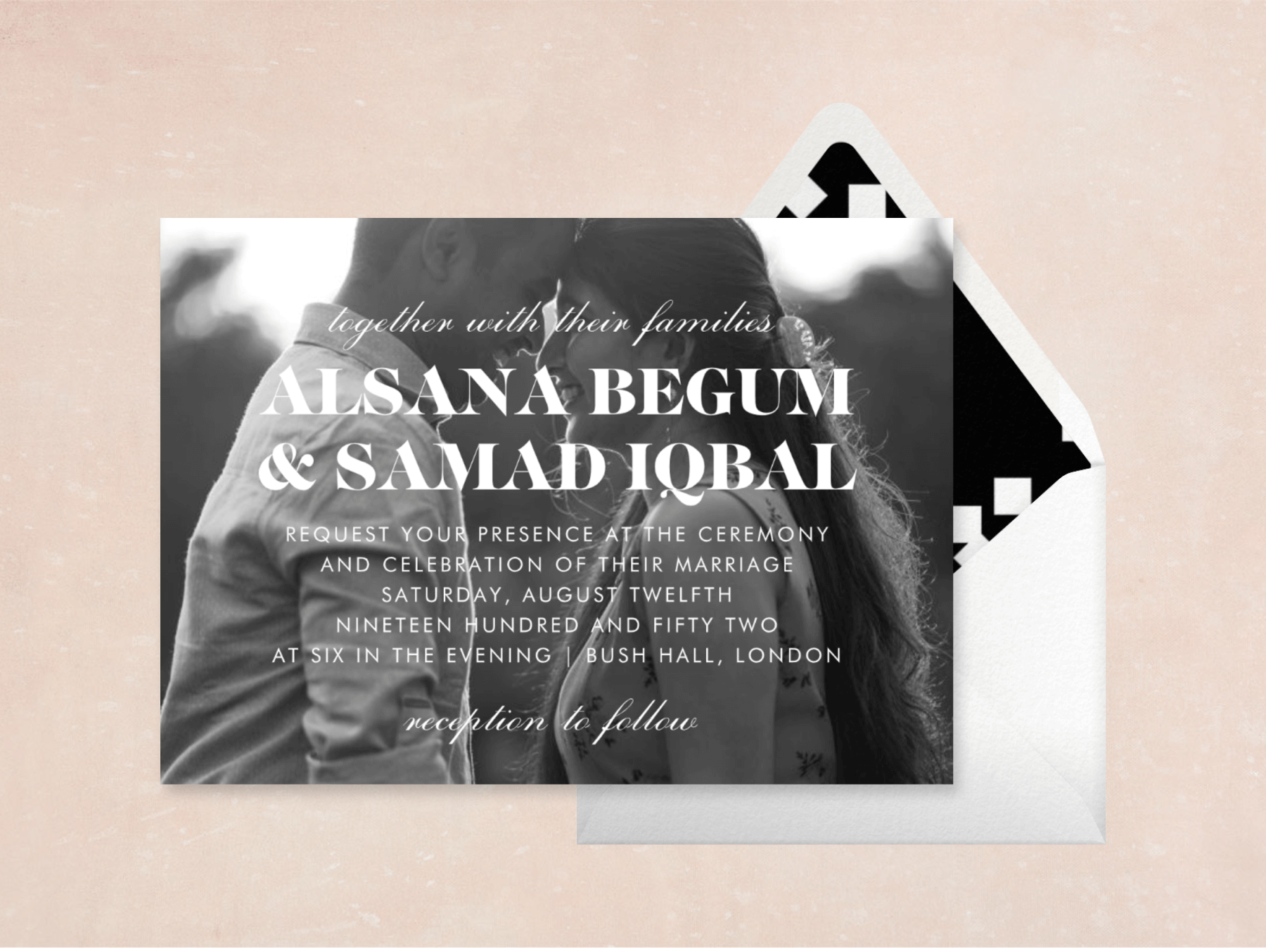A horizontal wedding invitation with a full-page upload-your-own photo background. The invitation is paired with a white envelope with a black and white patterned liner.
