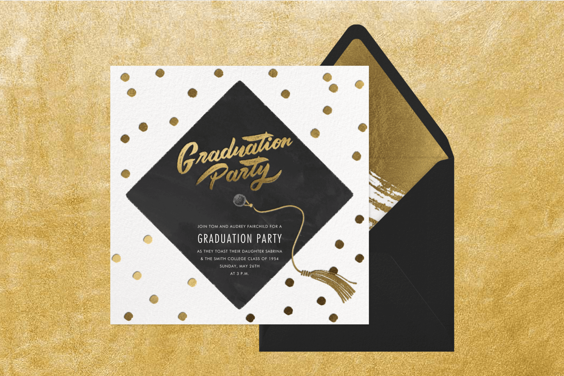 An invitation with the top of a mortarboard and gold confetti with ‘Graduation Party’ in gold script beside a black and gold envelope.
