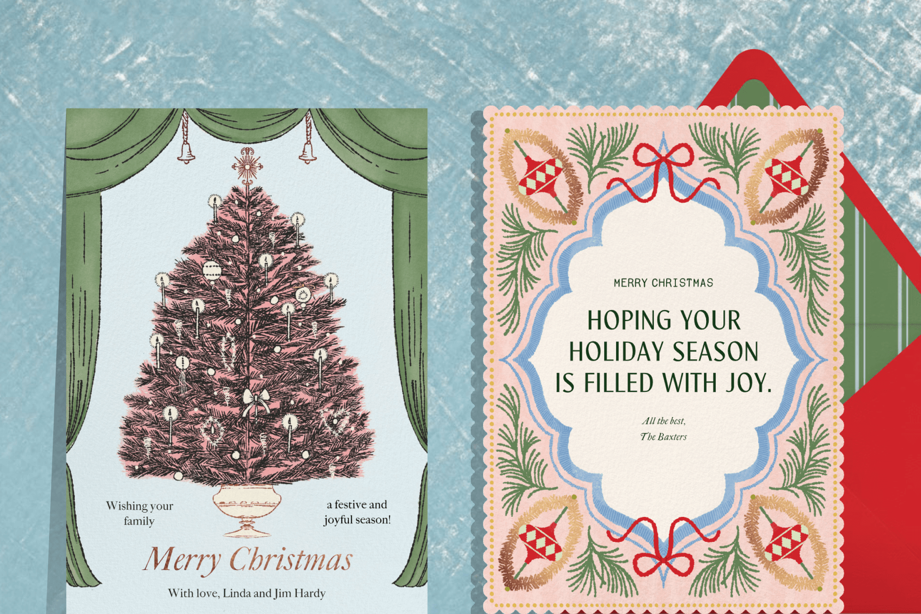 A textured blue background featuring two holiday cards: A Christmas card featuring a vintage illustration of a Christmas tree and green curtains; A Christmas card featuring an ornate border of vintage toys and greenery paired with a red envelope and green and white striped envelope liner.
