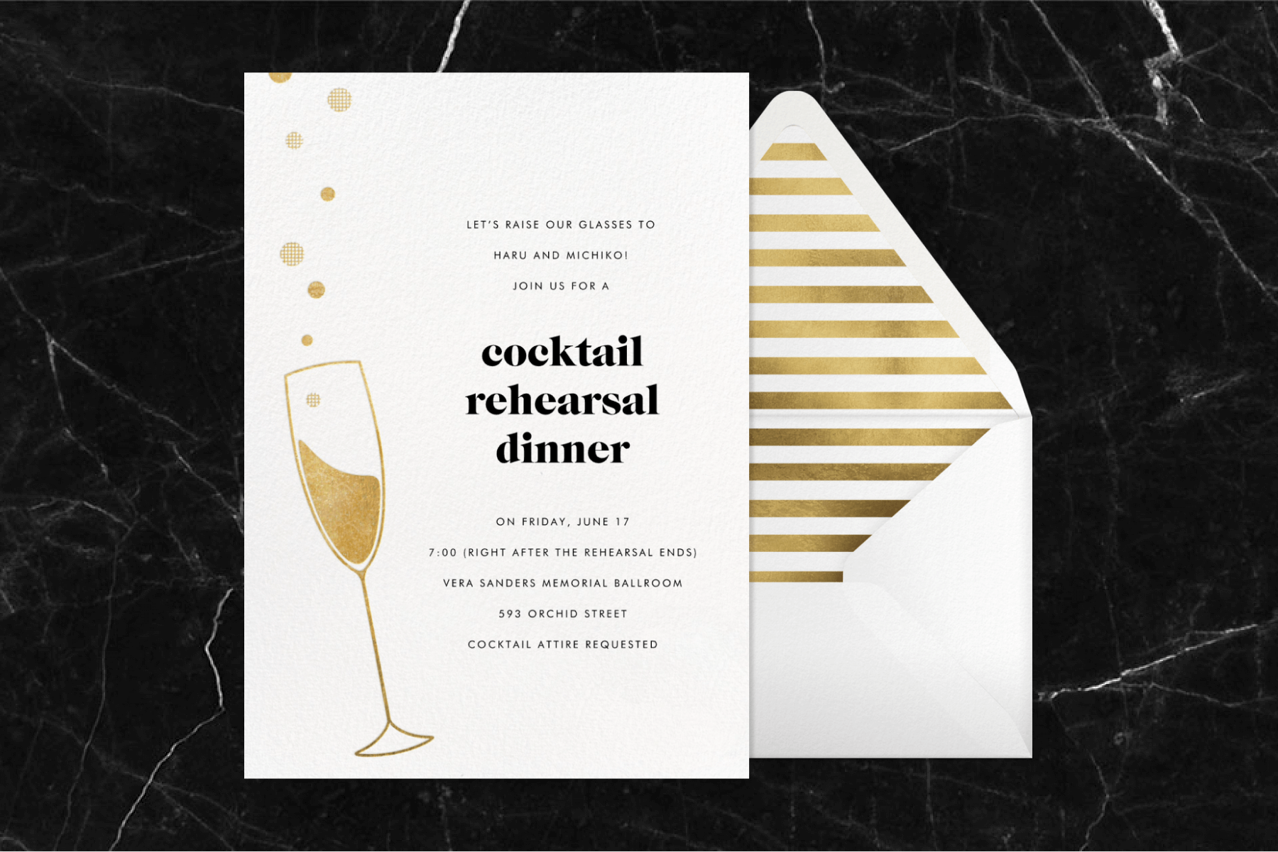 A rehearsal dinner invitation with an illustration of a Champagne glass and a gold and white striped envelope.