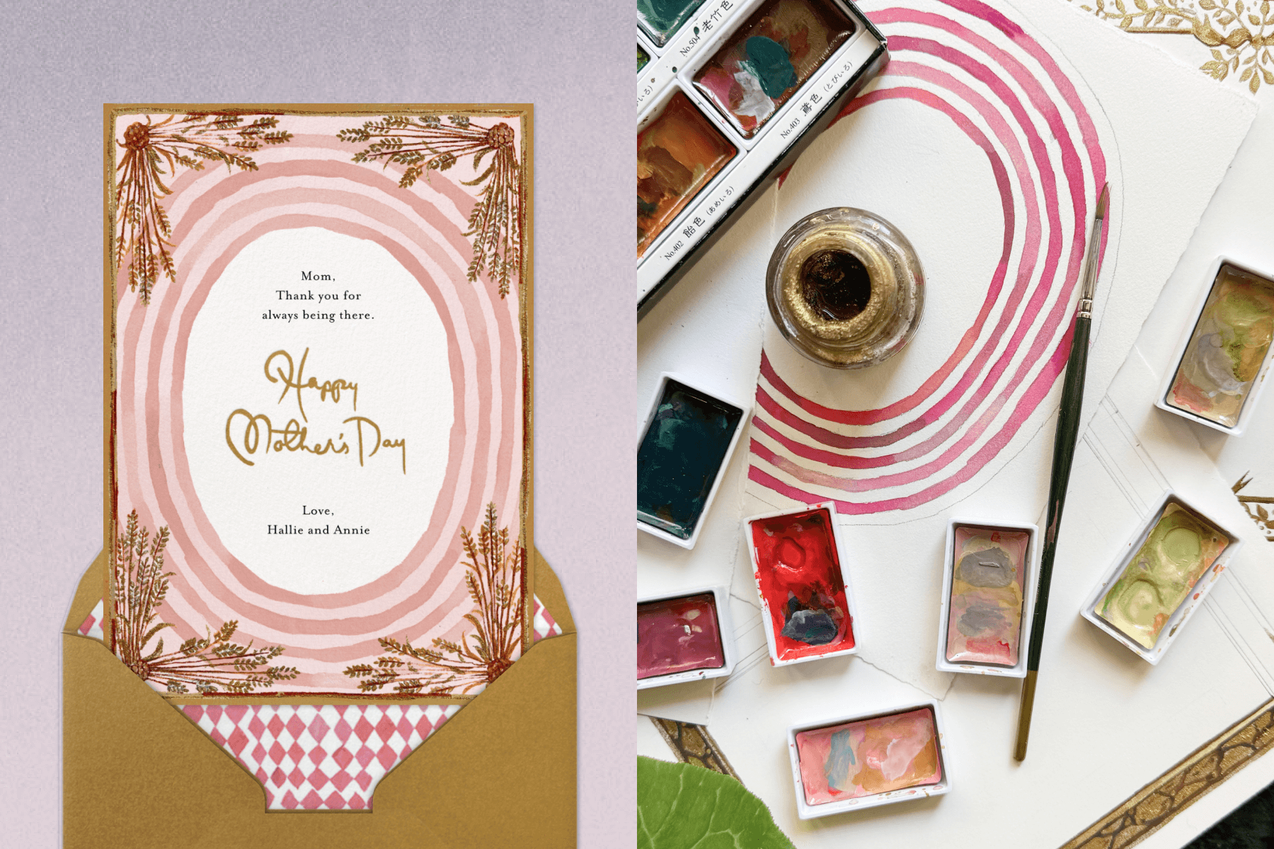 A Mother’s Day card with a pink watercolor oval border and gold trim with wheat in corners emerging from a gold envelope; a workspace of watercolor paint shows the creation of the card to the left. 