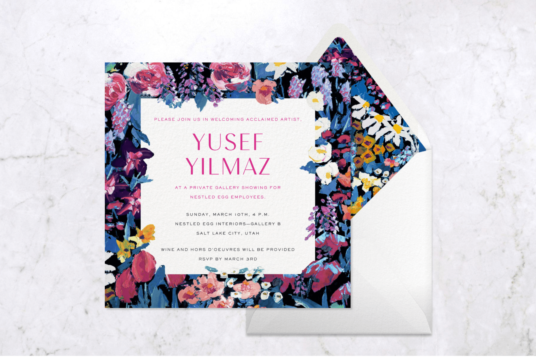 a square invitation with a wide, colorful floral border and an envelope with matching liner