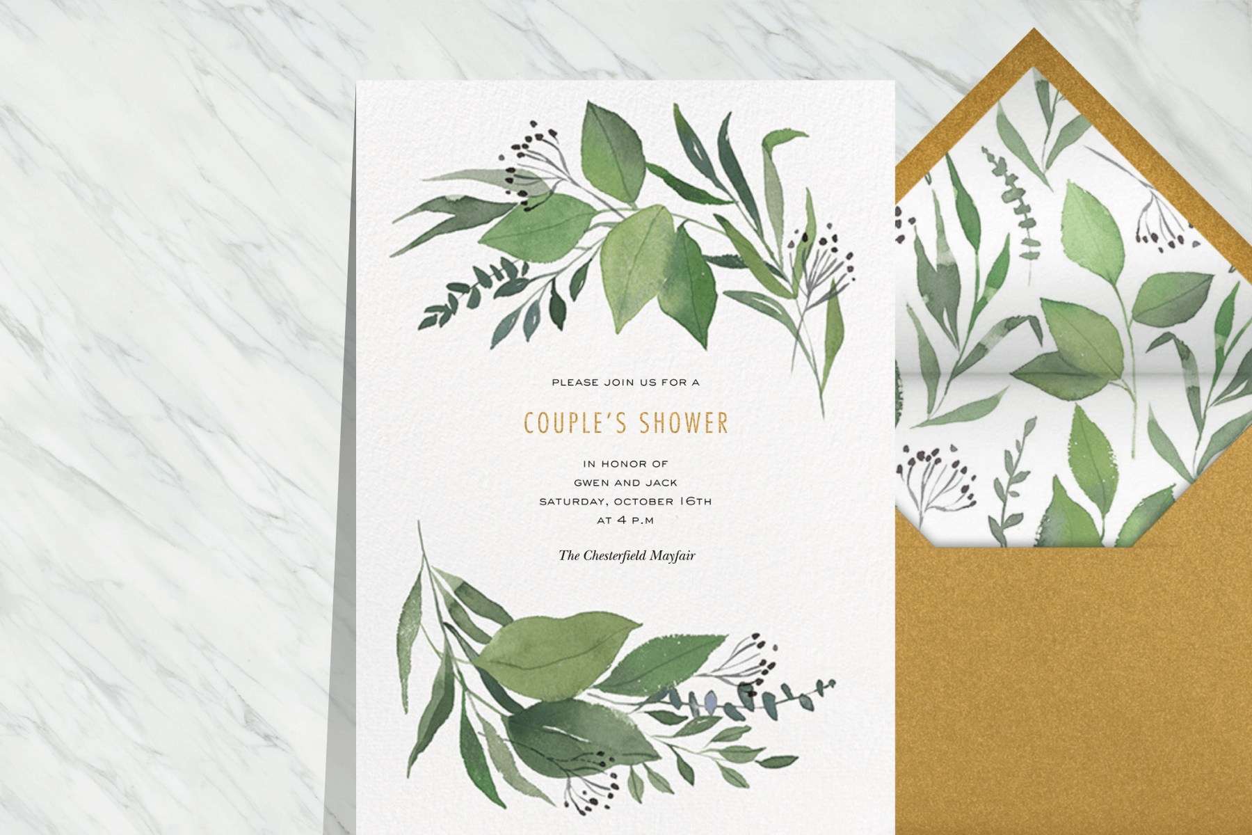A wedding shower invitation featuring watercolor greenery.
