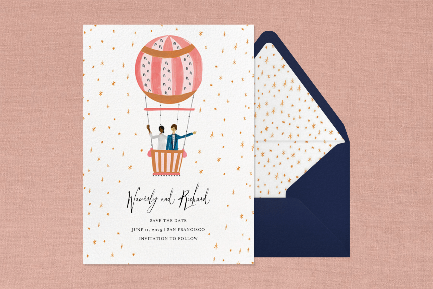 A save the date with two people in a hot air balloon in the stars and a matching navy envelope.
