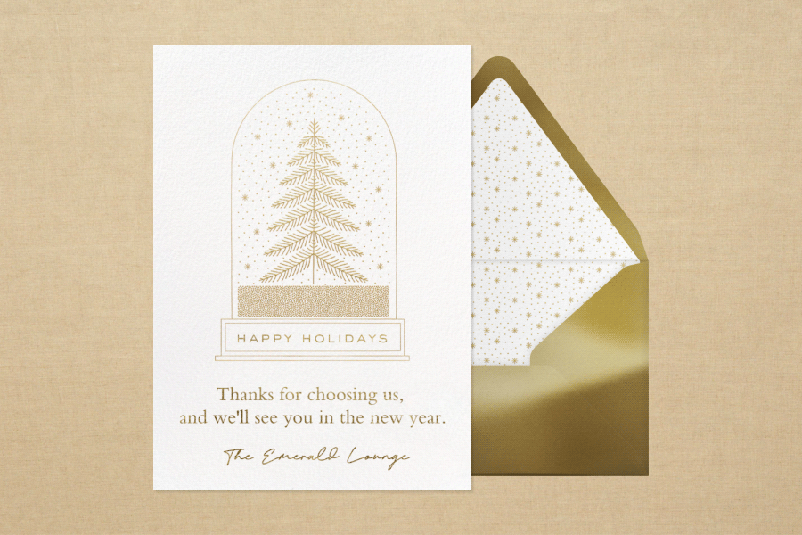 A holiday card with a simple linework snowglobe animates to display various messages.