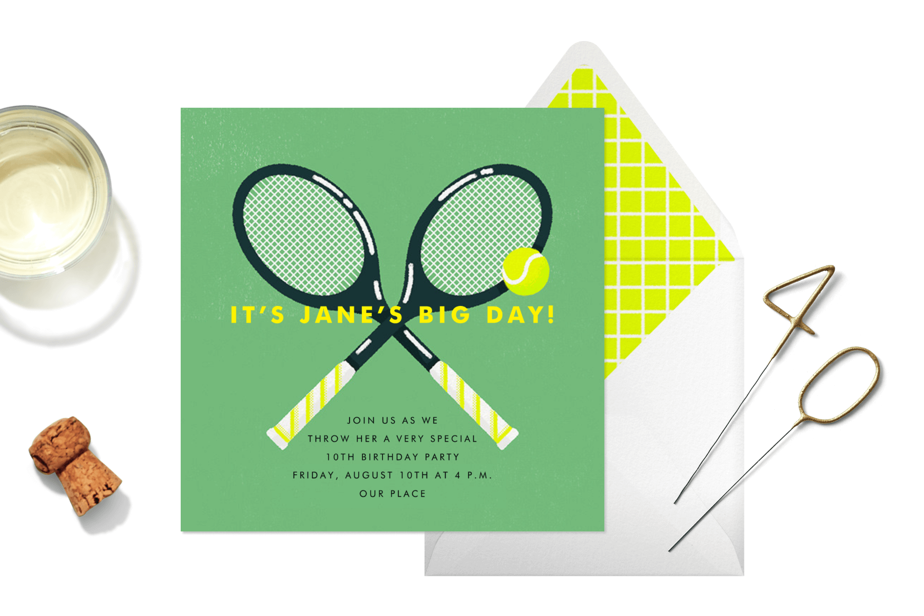 A green invitation with tennis rackets and ball, next to 4-0 cake toppers, a cork, an envelope, and a drink.