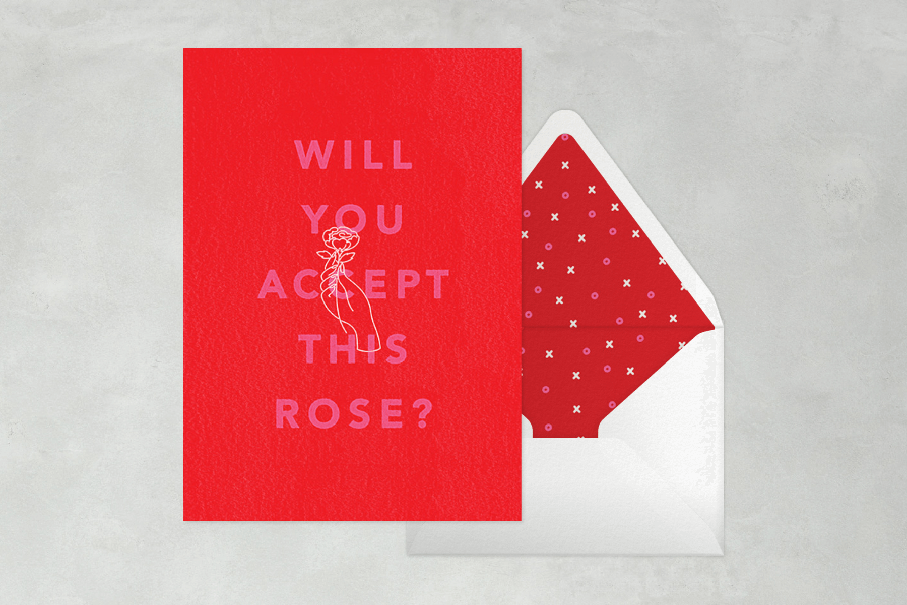 A red card says ‘will you accept this rose?’ with a hand holding a rose.