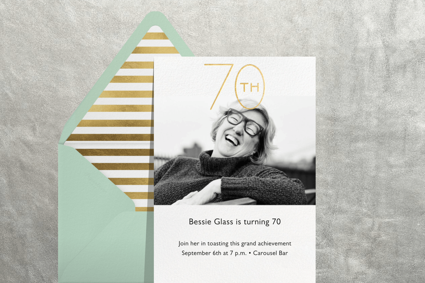 70th birthday invitation with a black and white photo of a woman
