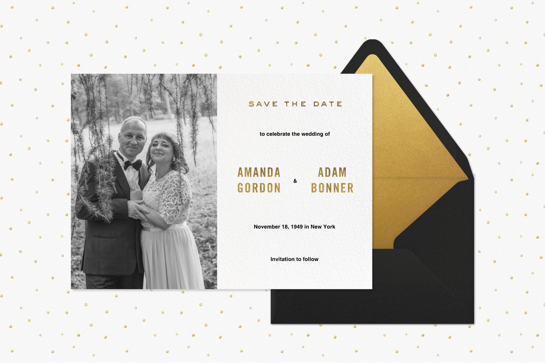 Save the date invitation featuring a black and white photo of a couple with gold writing, paired with a black envelope with a gold liner.