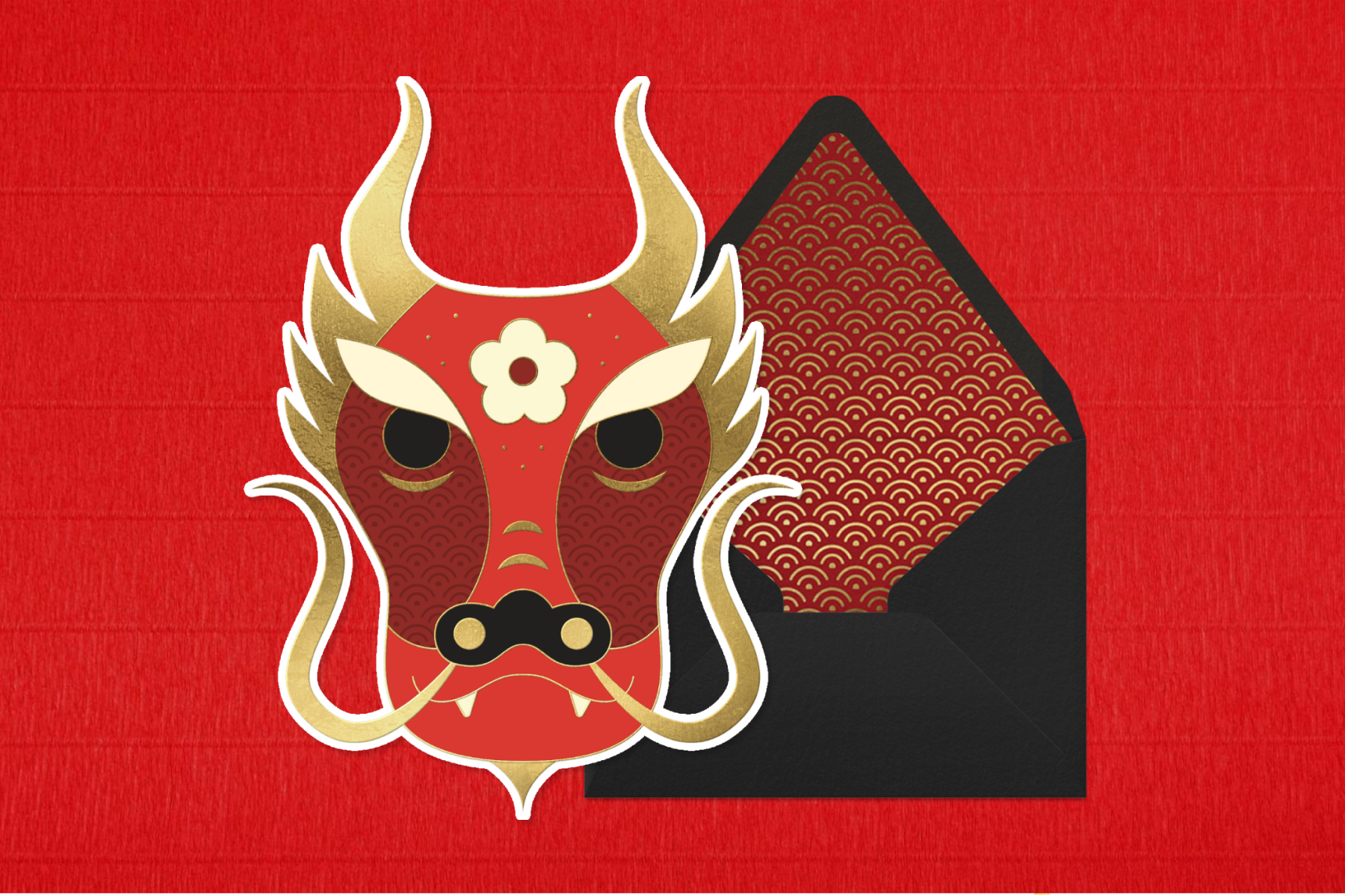 A card shaped like a red and gold dragon head with a black envelope.