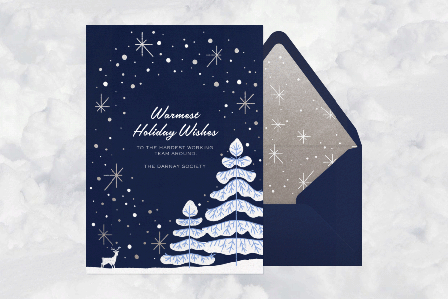 A navy blue card with two snowy fir trees and a deer beneath a starry night sky animates to display various messages.