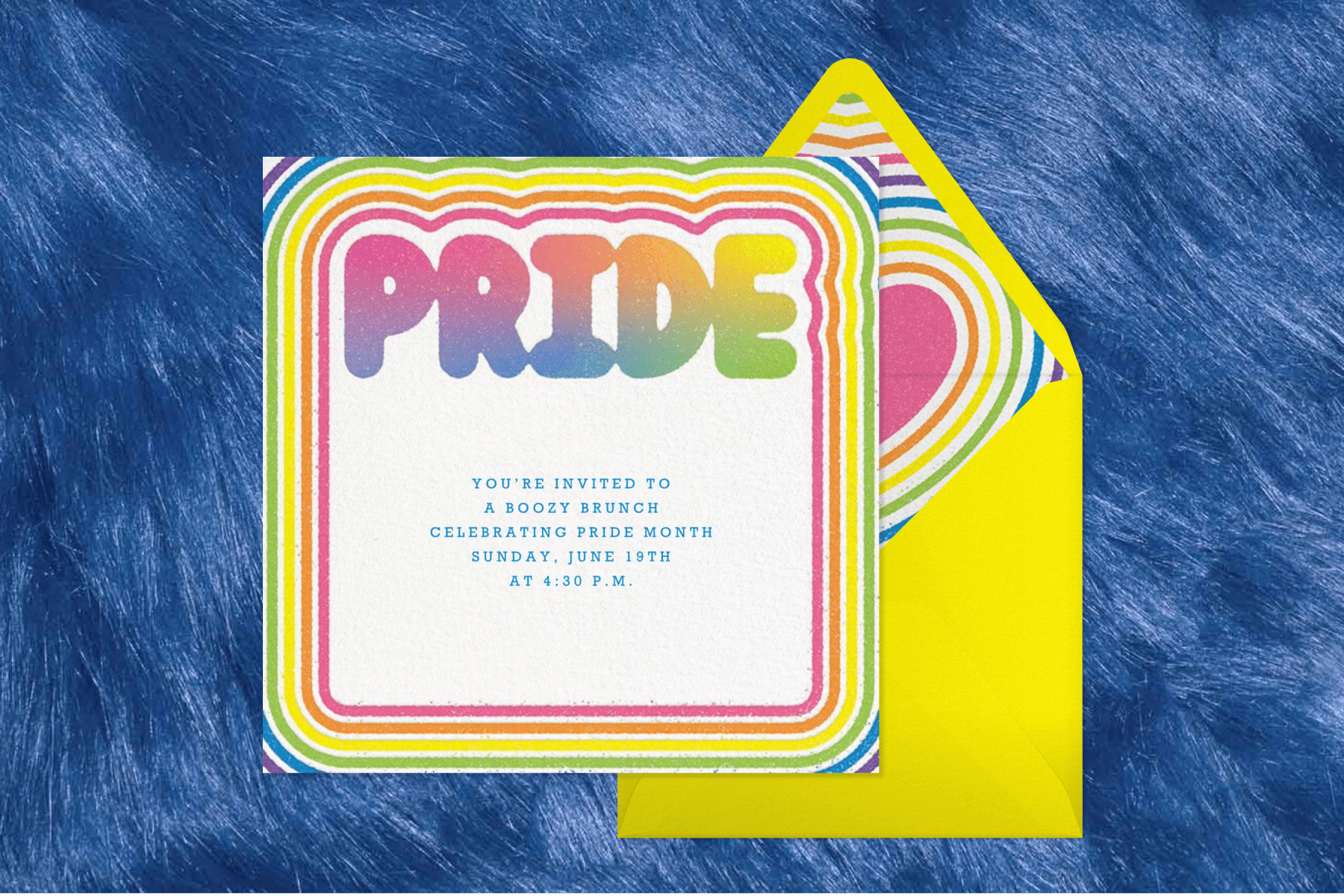 A square-shaped invitation with a rainbow border and bubble letters reading ‘PRIDE’ next to a yellow envelope over a blue fur backdrop.