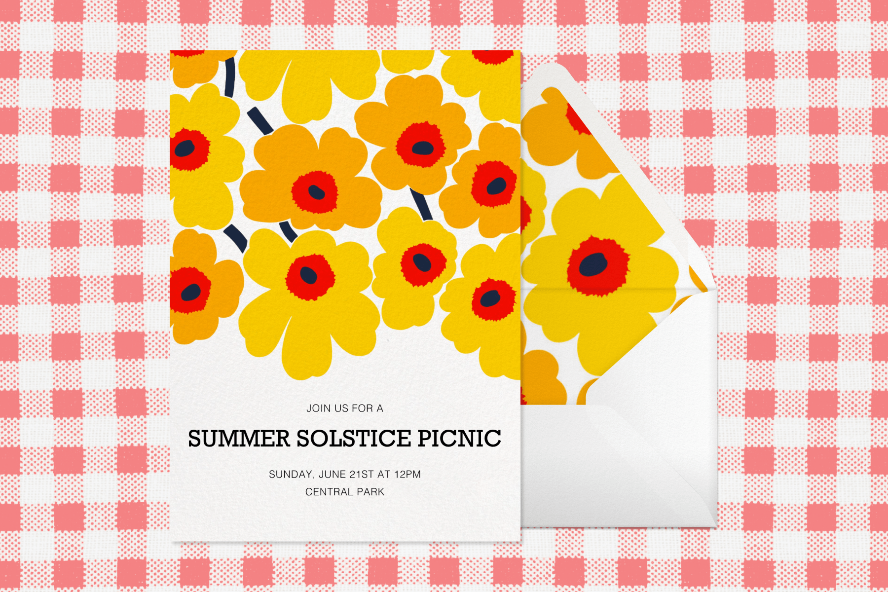  On a pink and white gingham backdrop, a summer solstice picnic invite with illustrations of yellow and red flowers sits next to a white envelope with yellow and red floral lining.