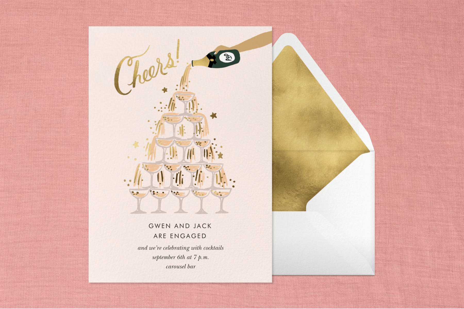 An engagement party invitation featuring script that reads ‘Cheers!’ and an illustration of a champagne tower paired with a cream envelope and gold envelope liner. 