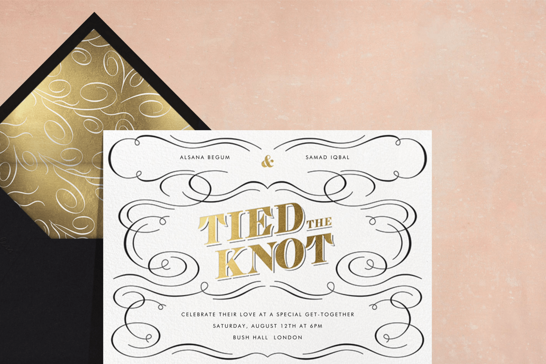 A wedding invitation featuring black curlicues and the text “Tied the Knot” in gold.
