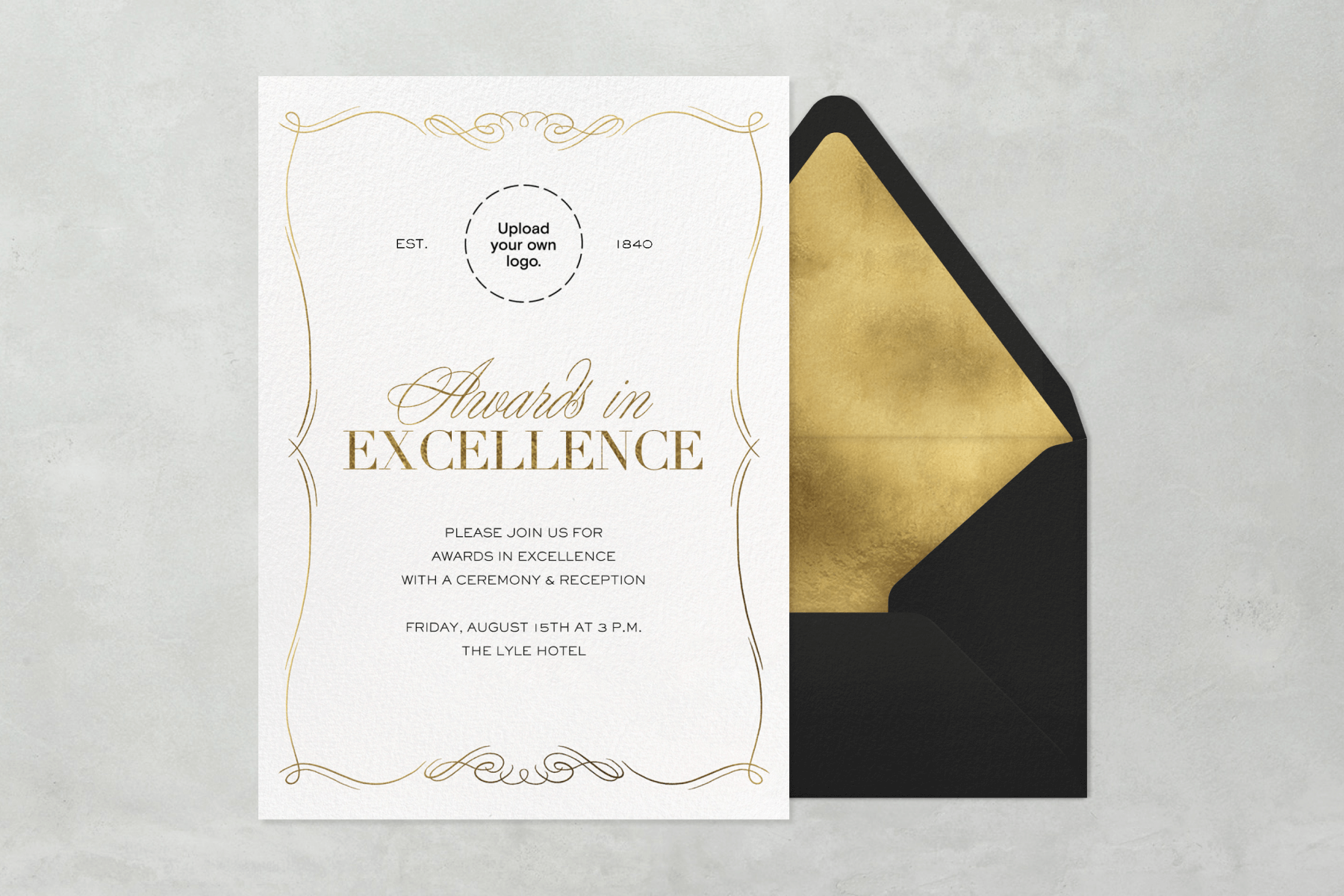 An “Awards in excellence” invitation with a delicate gold scroll around the border beside a black envelope with gold liner.