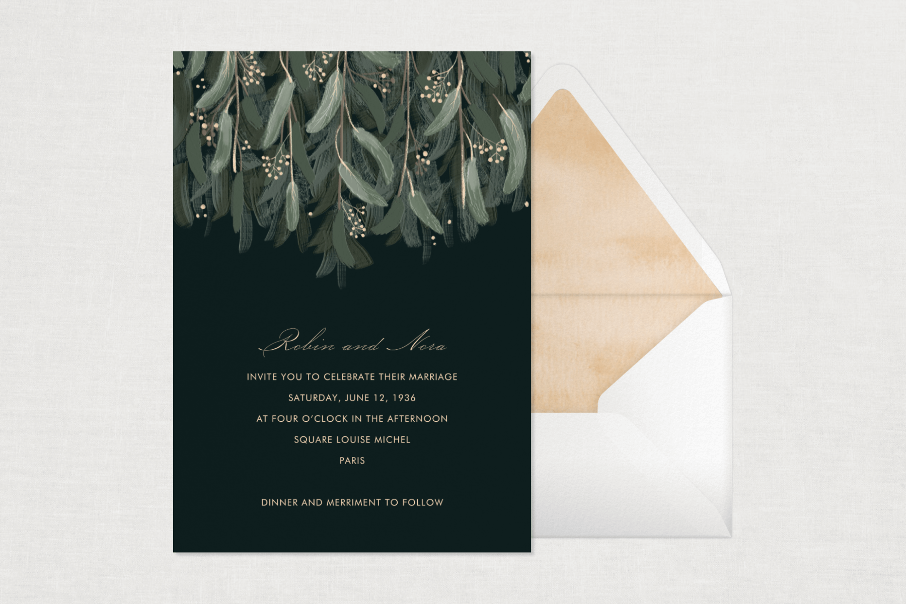 A black wedding invitation with silvery green leafy branches falling from the top.