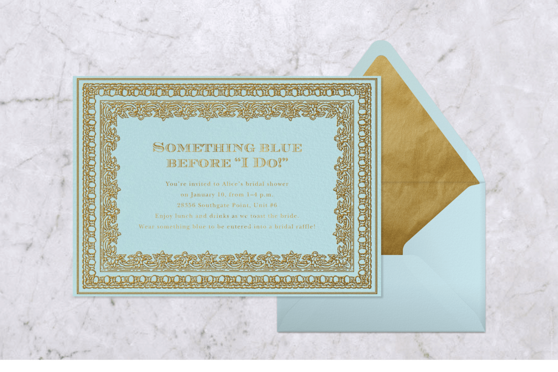 A light blue invitation with an ornate gold double border and matching envelope.