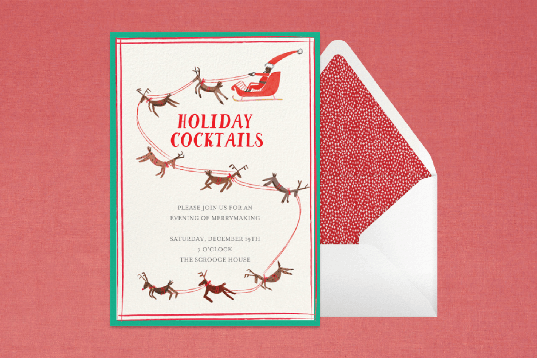 A cream holiday invitation featuring an illustration of santa driving a sleigh of reindeer and paired with an envelope with a red speckled liner.