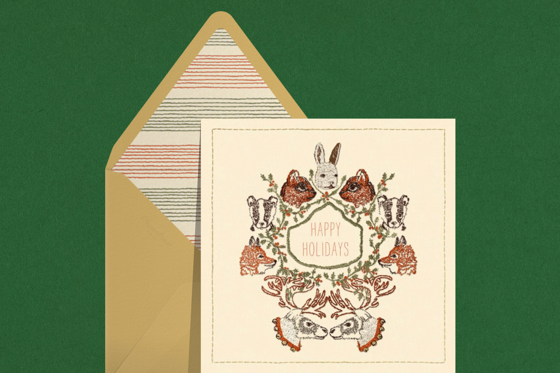 A holiday card with embroidered woodland animal faces including a rabbit, chipmunks, badgers, foxes, and deer in a circle.