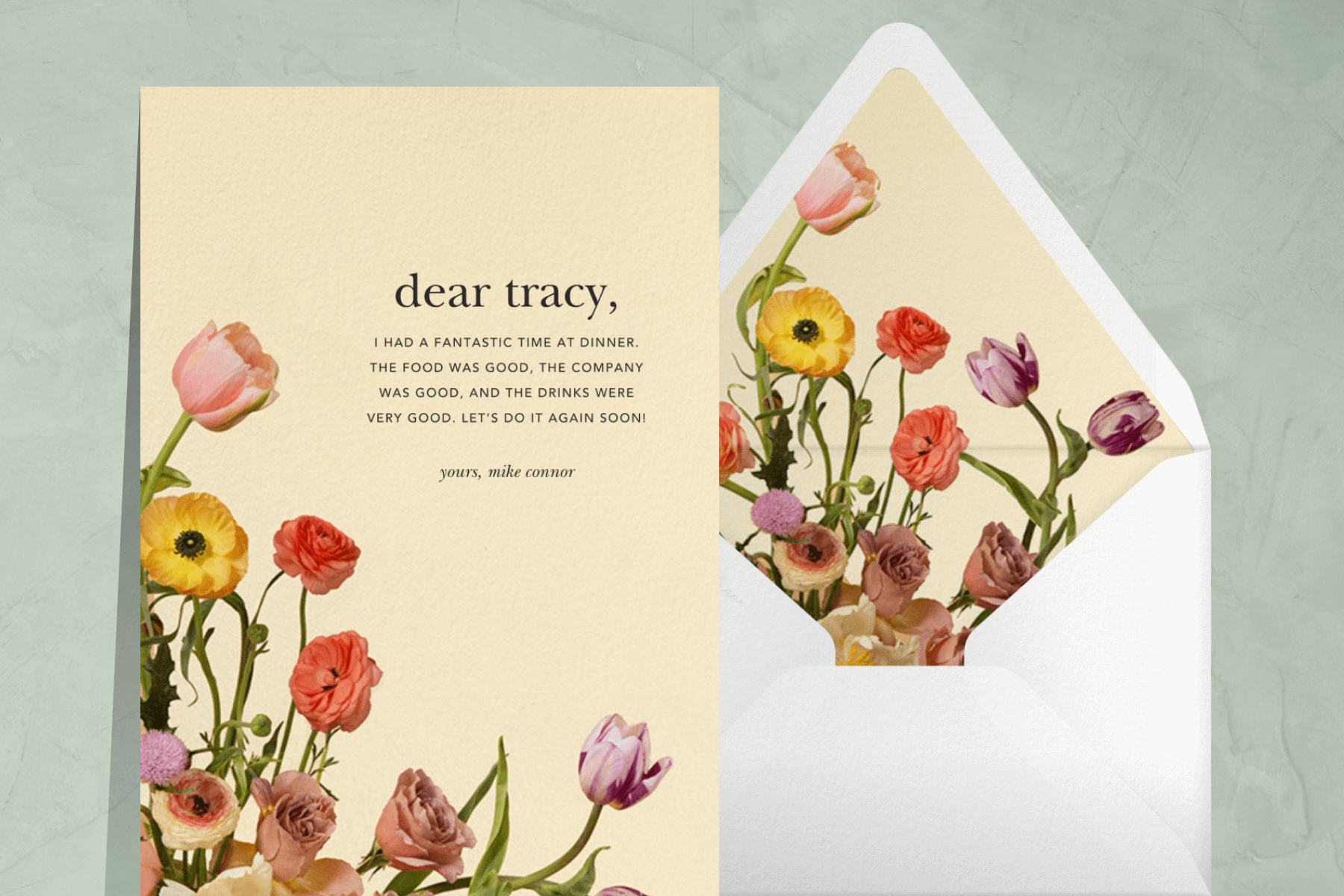 A thank you card with colorful photo-realistic flowers sprouting from the bottom left corner.