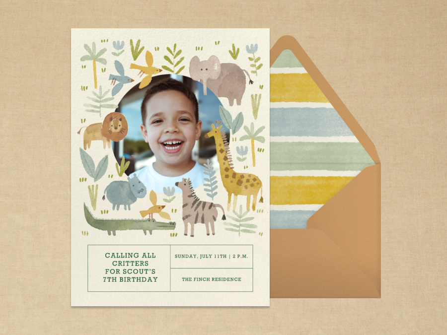 A child’s birthday party invitation with a boy’s photo in the center surrounded by safari animals including a lion, giraffe, zebra, hippo, crocodile, and more.