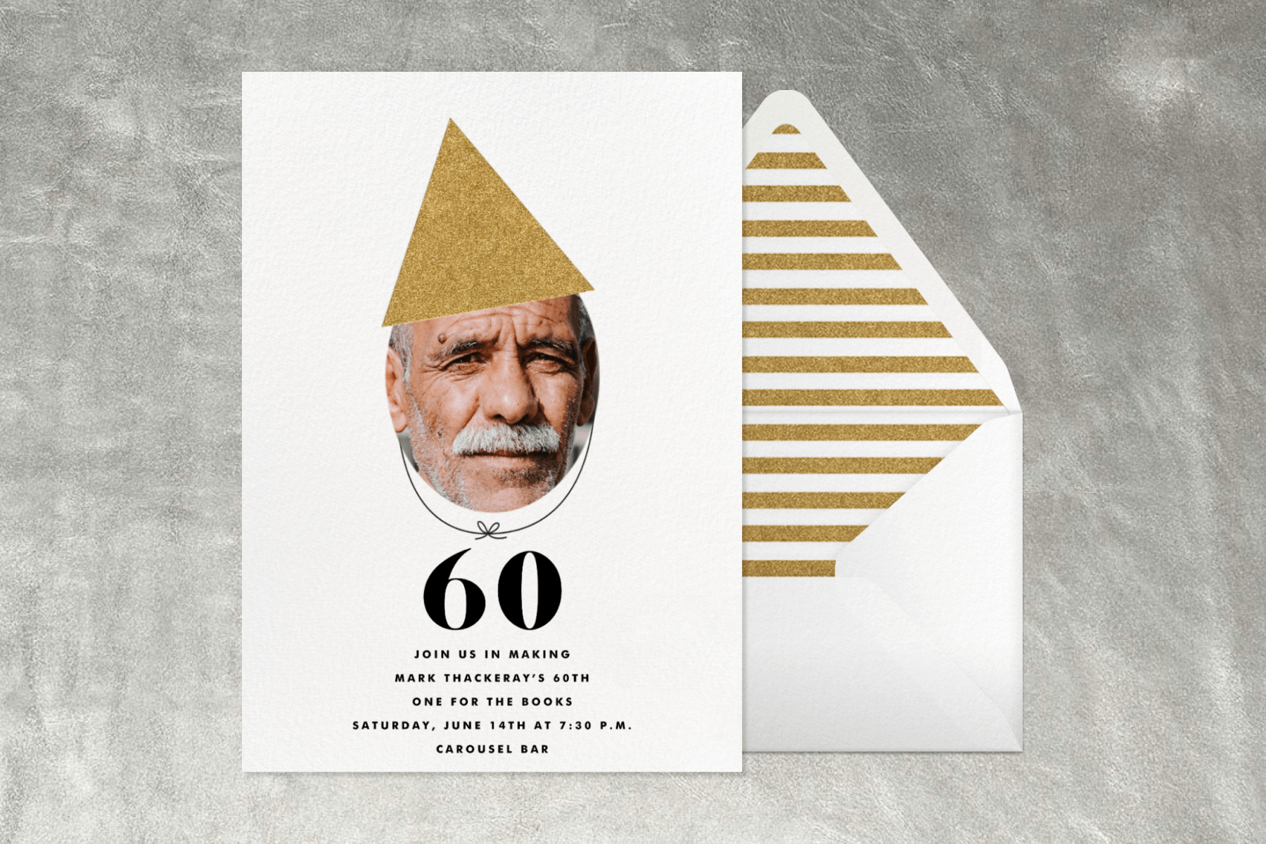 A 60th birthday invitation with an oval photo spot with a birthday hat on top of it.