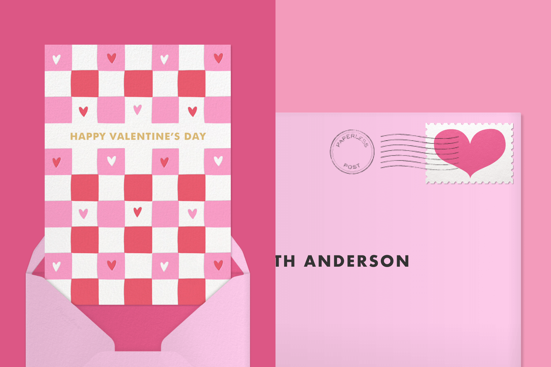A pink and red checkered card says ‘happy Valentine’s Day;’ the right corner of a pink envelope with a heart stamp.