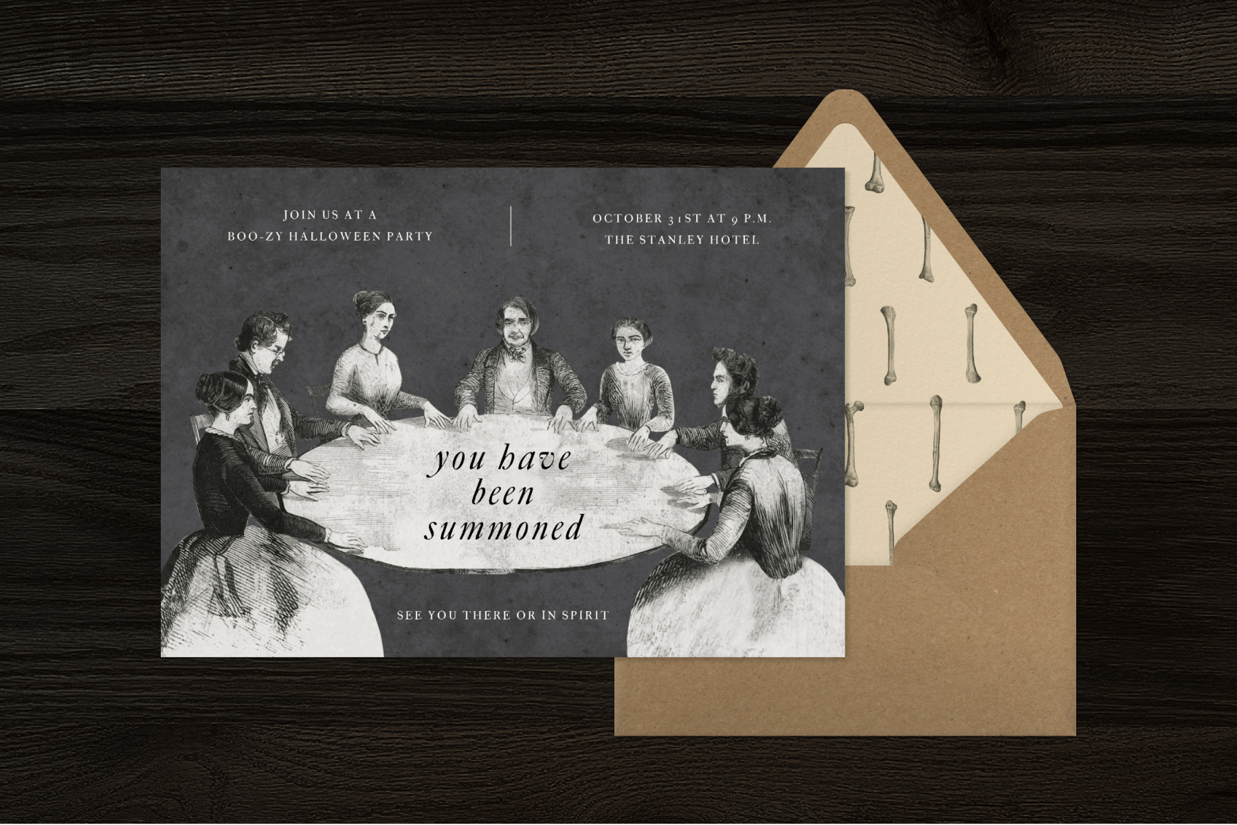 A black and white Halloween party invitation featuring women gathered around a table for a seance, paired with a brown paper envelope. 
