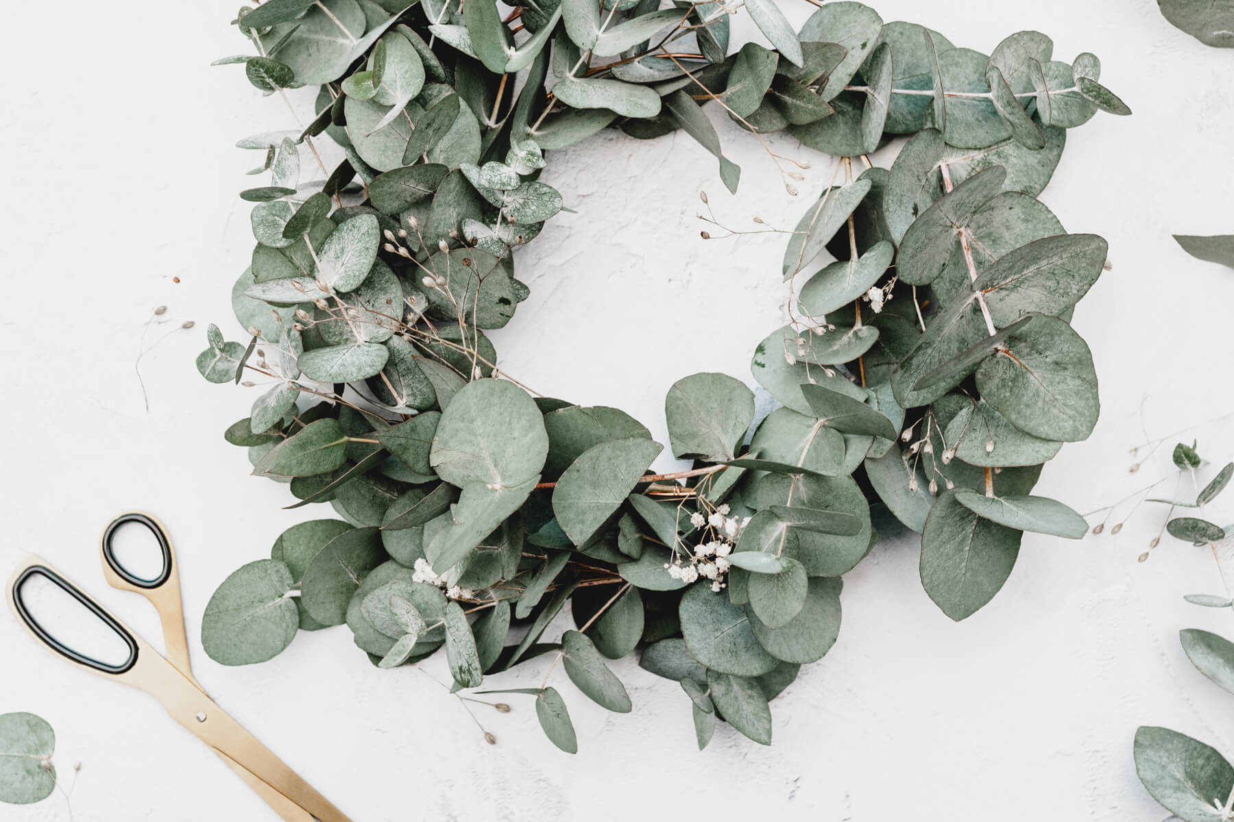 wreath-making socially distant office holiday party idea 