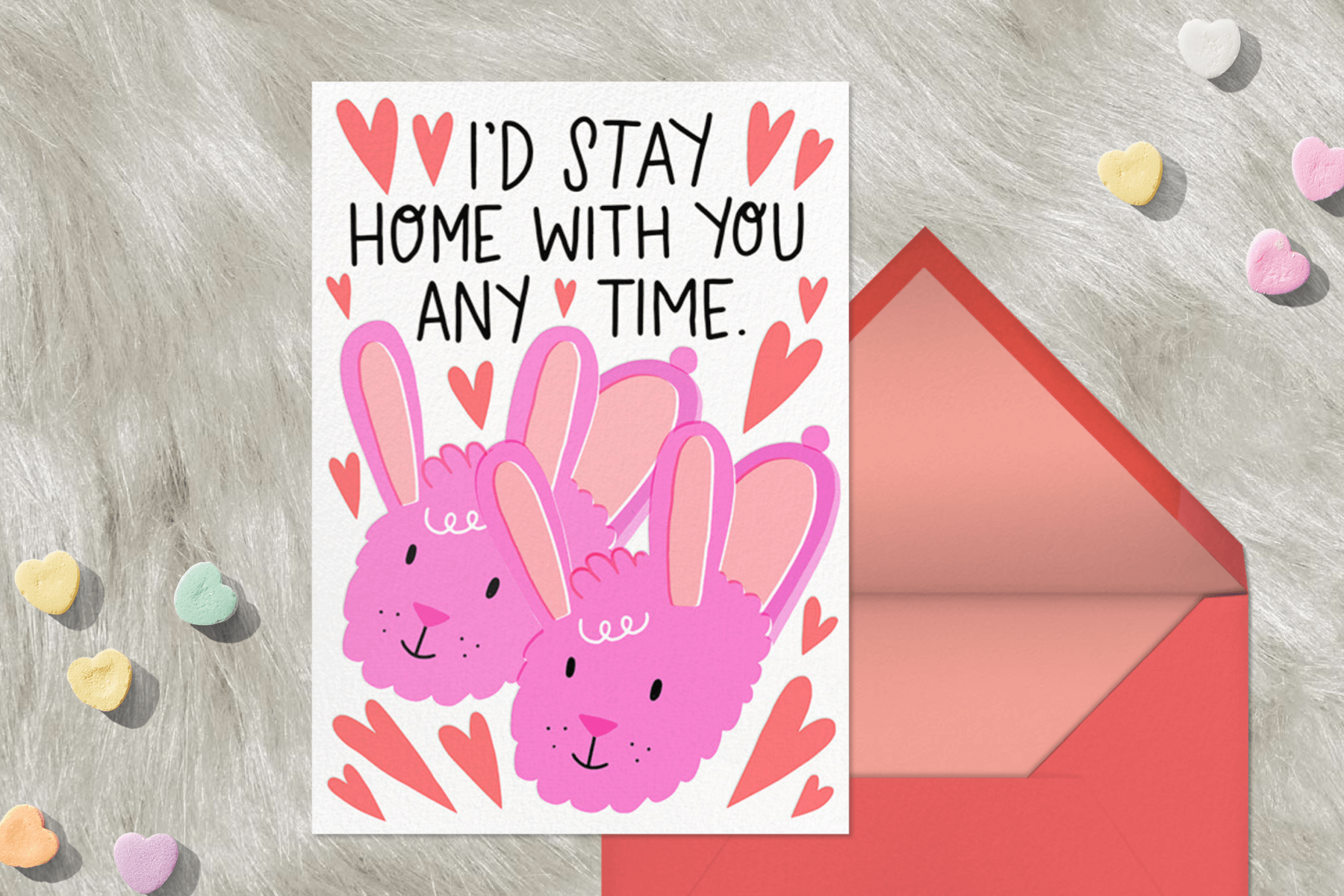 A Valentine’s Day card with an illustration of smiling bunny slippers.
