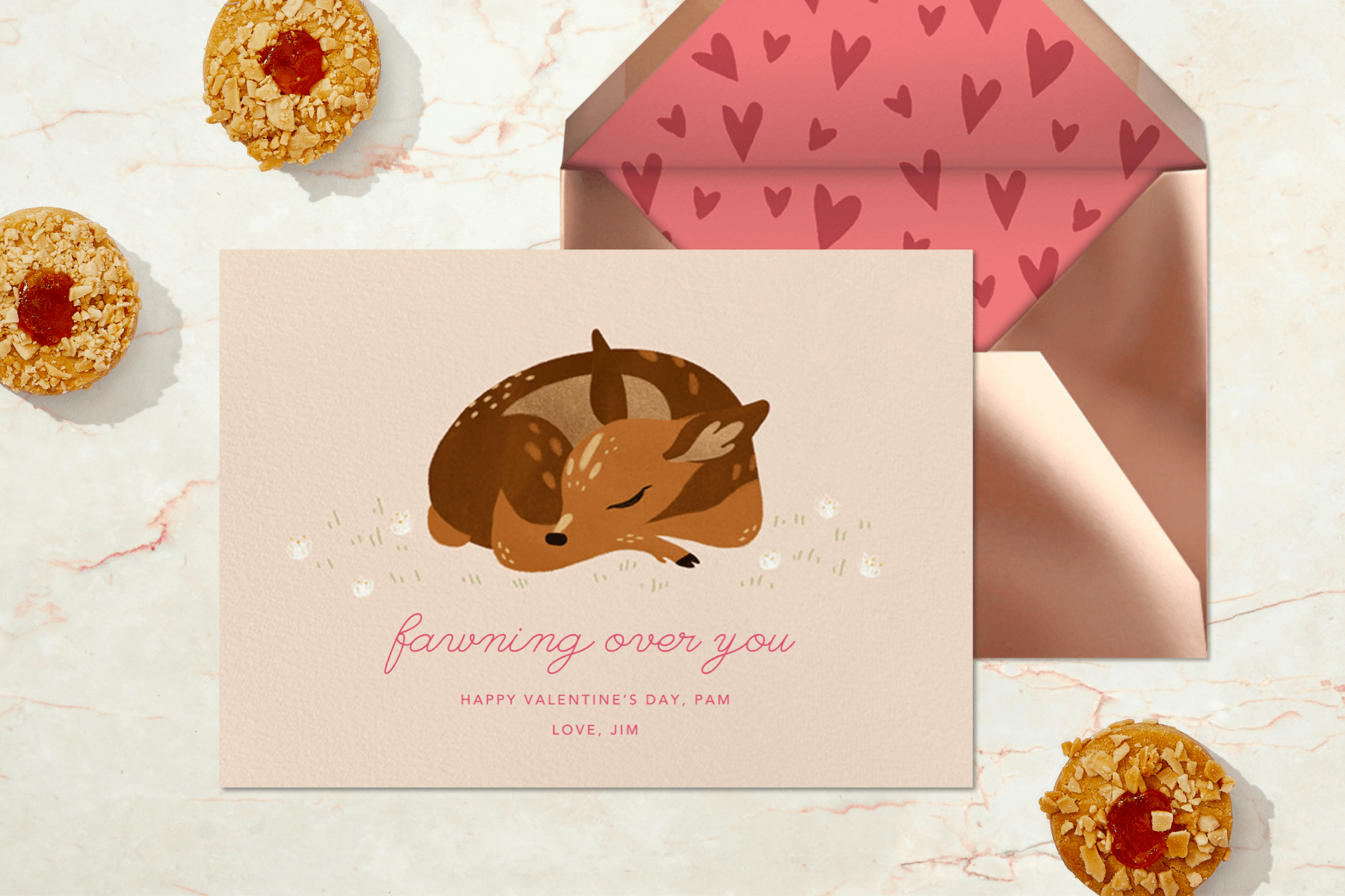 A Valentine’s Day card featuring a sleeping fawn.