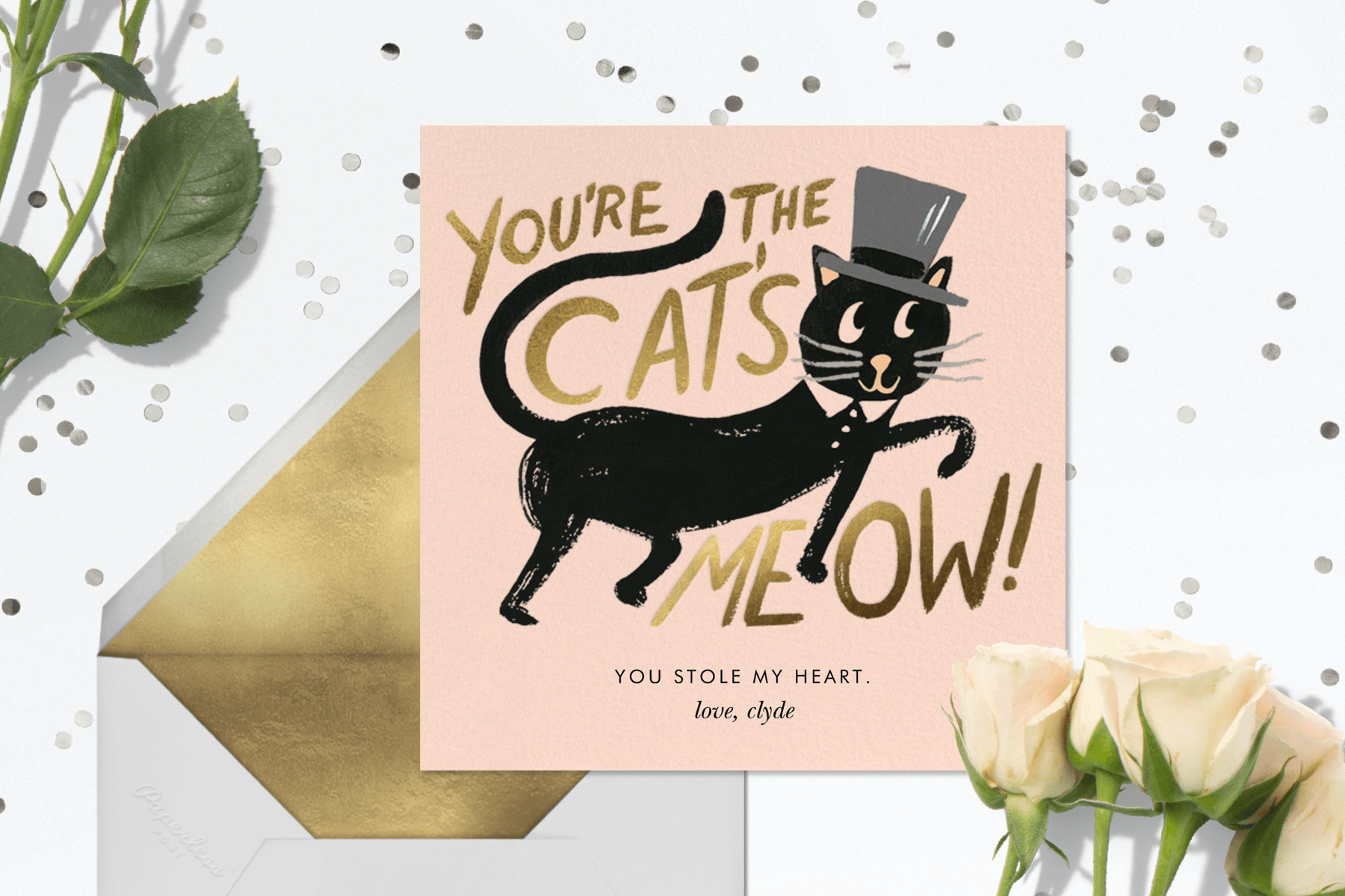 A Valentine’s Day card featuring a cat with a top hat.