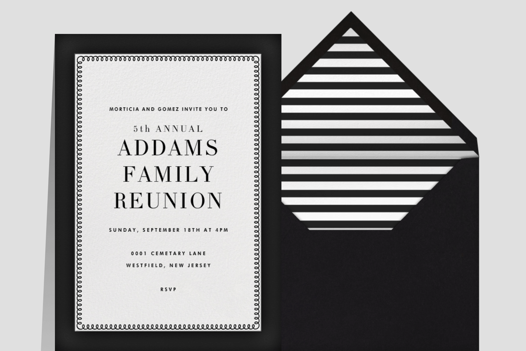 A white invitation with a black border and text. 