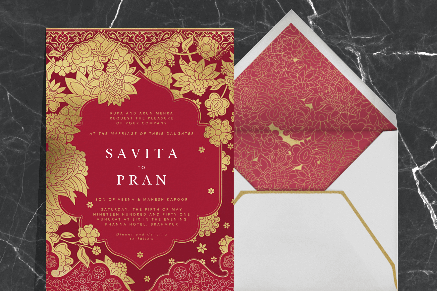 A maroon wedding invitation with gold-leaf flowers.