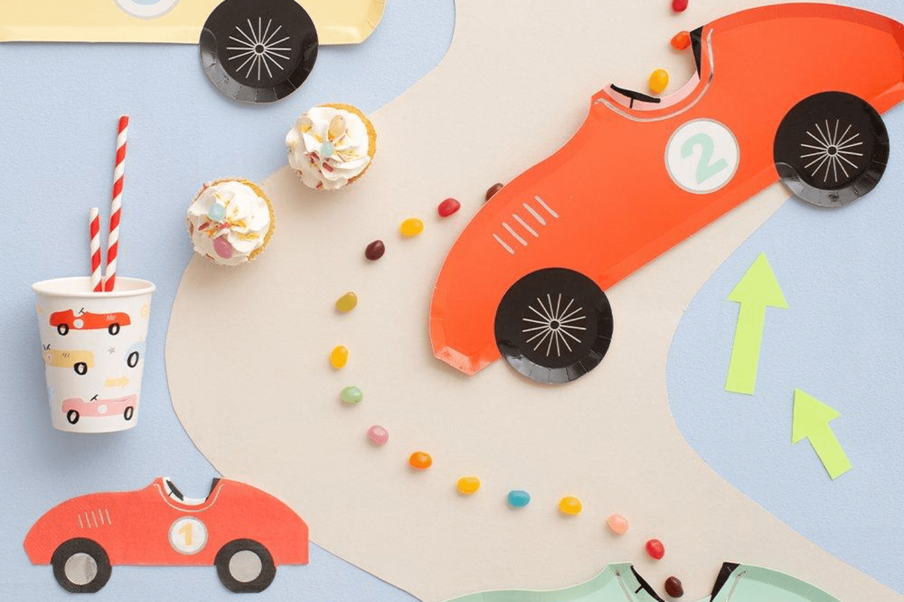 Overhead view of race car themed party supplies.