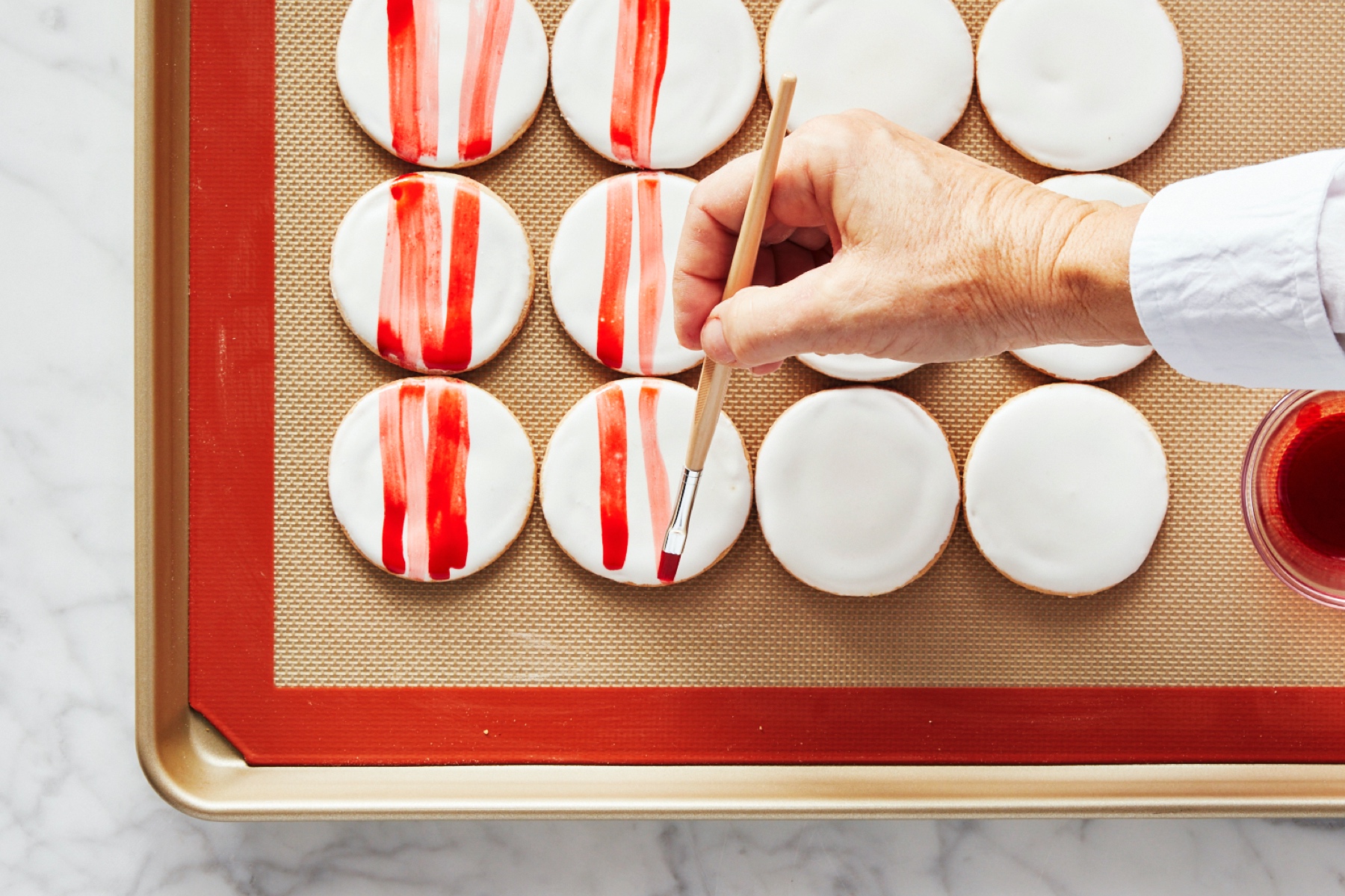 painting watercolor cookies for a Christmas cookie swap party