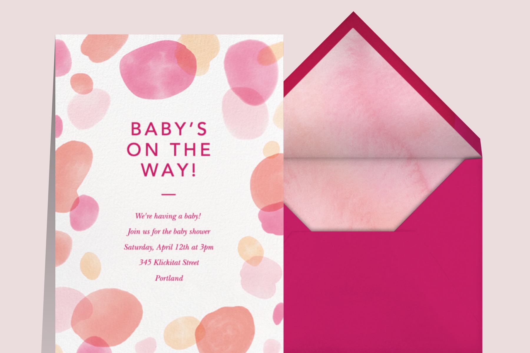 planning your own baby shower with a pink watercolor invitation