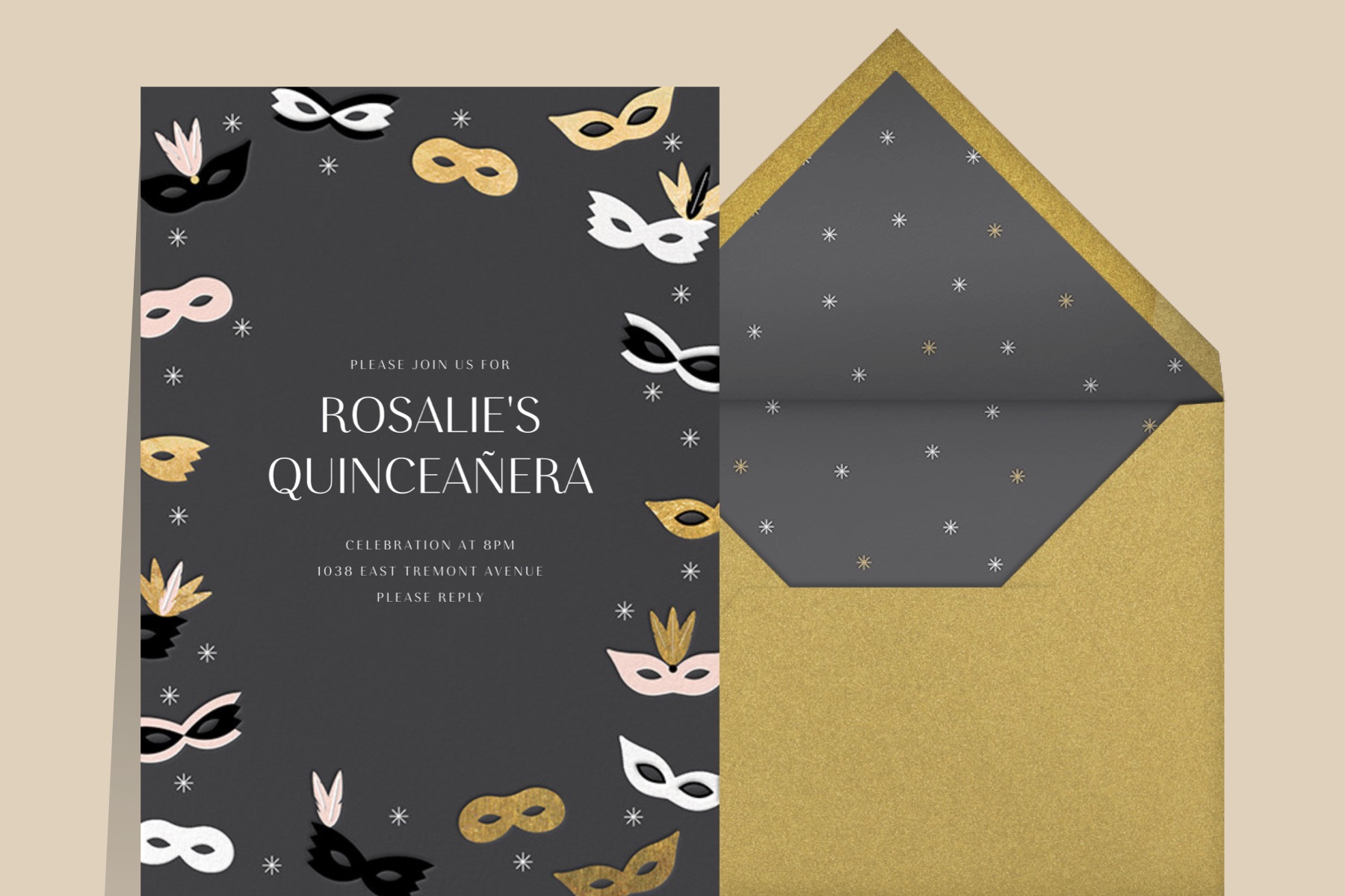Photo of “Masquerade” by Paperless Post, a black card with black and gold masquerade masks.